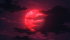 the sun is setting behind some clouds in the dark night sky with pink and red hues