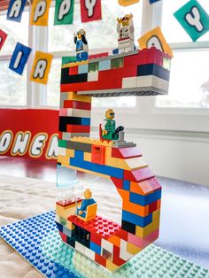 a birthday cake made out of lego blocks