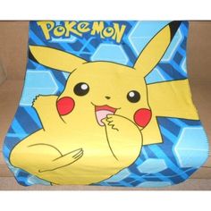 an image of a pokemon blanket on the couch