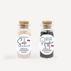 salt and pepper in glass bottles with labels on the front, side and back sides