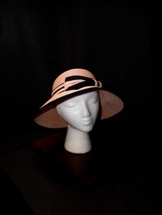 Peach Blossom Derby Hat - Delicate, Feminine, Elegant This elegant derby hat is a perfect blend of femininity and sophistication. Its soft peach hue and contrasting black band create a captivating look. Peach Color: A delicate and feminine color that adds a touch of sweetness. Contrasting Black Band: A stylish accent that adds visual interest. Intricate Design: A beautiful, eye-catching piece with delicate details. Premium Materials: Crafted with high-quality materials for durability and comfort. Versatile Styling: Can be worn in various ways to suit your style. Make a Statement Today! Elevate your style with this unique accessory--shop now and turn heads at your next event! Formal Hat, Hat Tea Party, Church Hat, Delicate Feminine, Tea Party Hats, Kentucky Derby Hat, Beautiful Eye, Peach Blossom, Derby Hat