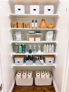 an organized pantry with toiletries and containers on the shelves, including rolls of toilet paper