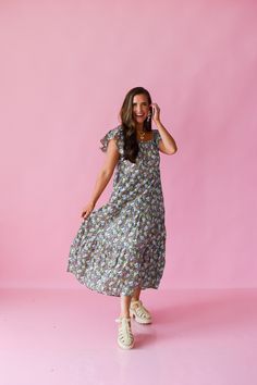 Effortlessly chic with a touch of romance, the Nova Floral Maxi Dress boasts elastic sleeves (that can be worn on or off the shoulder) and a flowy, relaxed fit. Perfect for fall, this dress will take you from day to night in style. Product Details: Measurements: BUST: small 17” medium 18" large 19" LENGTH: small 49” 100% cotton elastic bust ruffle sleeves roomy fit, could size down model wearing size small model stats: size 4, 5'4 Casual Billowy Floral Print Maxi Dress, Casual Billowy Maxi Dress With Floral Print, Casual Ruffle Sleeve Maxi Dress For Garden Party, Chic Flowy Peasant Dress For Summer, Chic Ruffle Sleeve Midi Dress For Vacation, Casual Ruffle Sleeve Maxi Dress For Vacation, Casual Ruffle Sleeve Maxi Dress For Day Out, Summer Billowy Floral Print Midi Dress, Spring Day Out Maxi Dress With Flutter Sleeves