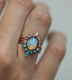 Ocean Ring Set, Engagement Ring Set with Oval Australian Fire Opal Wedding Fine Jewelry Opal Cabochon Ring, Wedding Opal Cabochon Ring In Fine Jewelry Style, Fine Jewelry Wedding Opal Cabochon Ring, Exquisite Multi-stone Opal Wedding Ring, Oval Opal Ring With Gemstone Accents For Wedding, Wedding Cabochon Opal Ring, Heirloom Opal Ring With Gemstone Accents For Wedding, Cabochon Opal Ring For Weddings, Unique Wedding Opal Ring