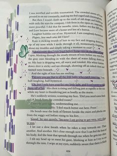 an open book with some writing on it's pages and the page is green