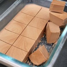 several blocks of chocolate in a glass dish