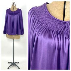 "DETAILS. bright | embroidered | super soft darling 1970's tunic. vintage bright purple blouse. slightly billowed long sleeves. embroidered neckline with faux tie. super soft and lightweight! great vintage condition. this top is from my private collection. MEASUREMENTS. BUST: up to 40\" WAIST: up to 38\" HIPS: -- LENGTH: 24\" ShOULDERS: 16\" SLEEVES: 22\" FABRIC: poly LABEL: -- Visit the shop: https://www.etsy.com/shop/EvesAppleVintage << you can find most of my private collection -- sourced thr Luxury Embroidered Purple Tops, Embroidered Tunic Top, Dress Blouse, Vintage Hippie, Purple Blouse, Embroidered Neckline, Embroidered Tunic, Bright Purple, Top Vintage