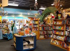 the children's book store is full of books and toys for kids to read