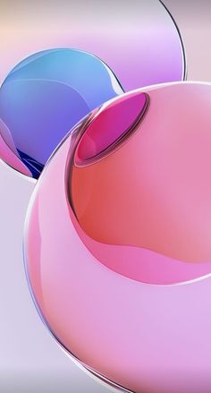 two different colored objects are shown in this artistic image, one is pink and the other is blue