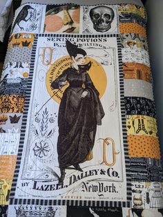 an image of a bed that has been made with halloween quilts on the cover