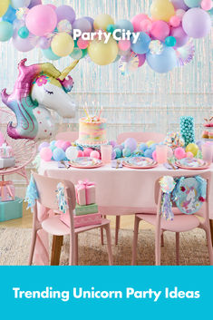 a unicorn themed party with balloons and decorations