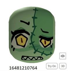 an image of a green zombie face with yellow eyes and fangs on it's head