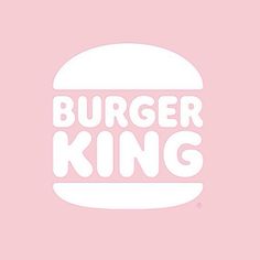 the burger king logo on a pink background