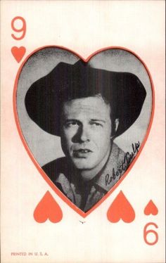 an old photo of a man wearing a cowboy hat in a heart - shaped card