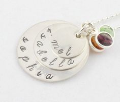 "Exquisite birthstone necklace Mother's Day gift for Mom or Grandma! This fabulous necklace features three sterling silver discs stacked on top of each other and personalized with your text. Swarovski crystal birthstone charms are added on top for some additional sparkle and color. The circles are hand stamped and personalized with the names or dates of your choice. *Each letter is hand stamped into the metal one letter at a time *Discs are handcrafted from sterling silver *Discs measure 1\", 3/ Birthday Stackable Sterling Silver Jewelry, Stackable Sterling Silver Jewelry For Birthdays, Stackable Sterling Silver Necklaces For Gifts, Sterling Silver Stackable Necklaces For Anniversary, Sterling Silver Stackable Jewelry For Birthday, Anniversary Stackable Round Necklaces, Sterling Silver Round Disc Jewelry For Mother's Day, Stackable Necklaces For Anniversary, Silver Hand Stamped Necklace For Birthday Gift