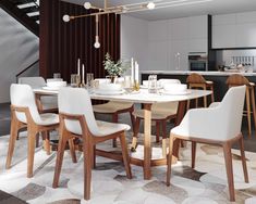 a dining room table with chairs and a vase on the table in front of it