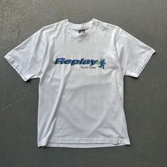 Vintage 90s Replay Physical Therapy Tee - Size: Large (tagged) (check measurements) - White colour. Screen printed design on front. Mark on sleeve and back. Stain on front. Cracking on print. Single stitch. Made in USA. Measurements (inches/cm) - Pit to pit: 20 inches / 50.5 cm - Length: 26 inches / 66 cm - Sleeve: 8 inches / 20.5 cm - Please note that our stock is second and vintage so please expect some signs of wear! - No refunds or exchanges! - Please contact us with any further questions! 90s Logo Print Tops For Streetwear, Retro Logo Print Tops For Streetwear, 90s Graphic Design Crew Neck Shirt, 90s Graphic Crew Neck Shirt, 90s Style Short Sleeve Shirt With Logo Print, 90s Inspired Printed Tops For Streetwear, 90s Graphic Design Tops With Relaxed Fit, 90s Cotton Tops With Logo Print, 90s Style Short Sleeve Streetwear Shirt