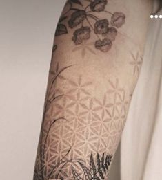 a person with a tattoo on their arm