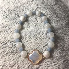 Natural Moonstone With Pearlized Coating Makes For Stunning Flashy “Pearls”! Accented With Aquamarine Stones And A Goldtone Opalite Clover. Bundle Items To Save On Shipping Elegant White Bracelets With Stones, Elegant White Moonstone Beaded Bracelets, Elegant Moonstone Beaded Bracelets, White Elegant Crystal Bracelet With Natural Stones, Elegant White Beaded Bracelets With Gemstones, Elegant White Gemstone Beaded Bracelets, Elegant White Crystal Bracelet With Natural Stones, Elegant White Moonstone Crystal Bracelet, Elegant White Beaded Gemstone Bracelets