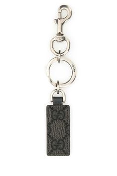 a key chain with a black and white pattern on it