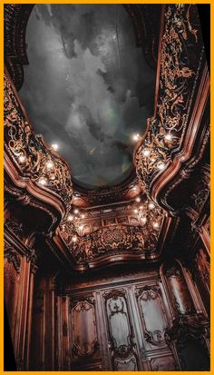 an ornately decorated ceiling with chandeliers and clouds in the sky above it