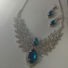 Classy And Beautiful!!! New In Box Blue Rhinestone Jewelry Sets For Gift, Glamorous Blue Rhinestone Jewelry, Luxury Blue Rhinestone Necklaces, Rhinestone Pendant Necklace, Costume Jewelry Style, Multicolor Rhinestone Necklace With Jewels, Costume Jewelry, Rhinestone Necklace, Bead Jewellery, Blue And Silver, Womens Jewelry Necklace