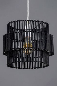 a black chandelier hanging from the ceiling