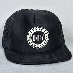 Listed is a vintage UAW Union Unity trucker hat, mesh back, snap back, made in the USA. One size fits all. Excellent condition, inner tag is crisp and white. Foam is in good shape inside. Some clouding of plastic on snapback. Thank you for looking! Uaw Union, Black Trucker Hat, Snap Back, Snap Backs, Hat Cap, Trucker Cap, One Size Fits All, Hats For Men, Mousse