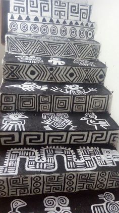 some black and white stairs with designs on them