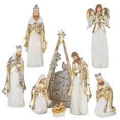 the nativity figurines are all gold and white