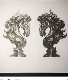 two vases with designs on them sitting side by side in front of a white wall