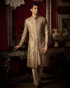 This sherwani set features all over matt sequin on an ash grey raw silk base. It is paired with silk kurta and off-white cotton pants. Complimenting footwear is also available. DELIVERY TIMEPlease allow 8-12 weeks for your outfit to arrive. FABRIC DETAILSSherwani - Raw Silk, Kurta - Silk, Trousers - Cotton Professional cleaning only. Open Sherwani Men, Silk Kurta For Men, Designing Aesthetic, Grey Sherwani, Open Sherwani, Kurta Wedding, Raw Silk Kurta, Raw Silk Embroidery, Seema Gujral