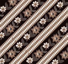 a black and white striped pattern with flowers on it's side, in the center is