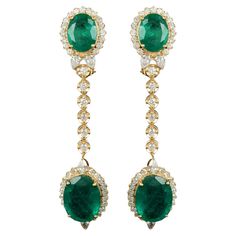 Surrounding the emeralds are sparkling diamonds, adding a touch of glamour and brilliance to the design. These diamonds are of the highest quality, meticulously set to maximize their fire and brilliance, creating a dazzling halo that accentuates the beauty of the emeralds. Item Code :- SEE-12253A Gross Wt. :- 13.31 gm 18k Yellow Gold Wt. :- 10.45 gm Natural Diamond Wt. :- 2.02 Ct. ( AVERAGE DIAMOND CLARITY SI1-SI2 & COLOR H-I ) Emerald Wt. :- 12.30 Ct. ✦ Sizing ..................... We can adjust most items to fit your sizing preferences. Most items can be made to any size and length. Please leave a note at checkout or contact us via 1stDibs conversation. Even after purchasing the item, you can still ask us to adjust the size or length. We will try our best to fix it if it is possible. ✦ I Green Diamond Earrings With 17 Jewels For Formal Events, Green Diamond Earrings With 17 Jewels For Formal Occasions, Formal Emerald Earrings With Diamond Accents, Elegant Green Diamond Earrings With Brilliant Cut, Green Diamond Drop Earrings With Accents, Green Pave Setting Earrings For Wedding, Elegant Green Diamond Earrings, Elegant Green Diamond Dangle Earrings, Elegant Green Dangle Diamond Earrings