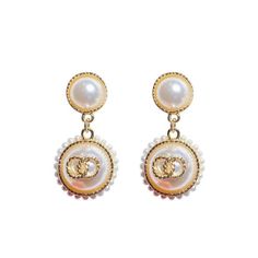 Look elegant and glamorous with these Graceful Glamour Pearl Earrings! These earrings put the “glam” in glamourous! Shine bright with these exquisite earrings and get ready to be the belle of the ball! These earrings feature pearl studs, gold detailing, small pearls circling larger pearl dangles, and a secure post backing. • Earrings measure 2" in length and 1" in width Trendy Gold Pearl Earrings, Evening Pearl Earrings With Pearl Chain, Chic Gold Clip-on Earrings With Pearl Drop, Evening Pearl Chain Earrings, Pearl Chain Earrings For Evening, Classic Rose Gold Pearl Earrings For Parties, Luxury Pearl White Pearl Earrings, Glamorous Pearl Embellished Earrings For Evening, Luxury Gold Pearl Embellished Earrings