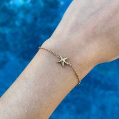 Starfish Bracelet - Capeology Adjustable Starfish Bracelet With Lobster Clasp, Ocean-inspired Bracelet With Starfish Charm, Adjustable Ocean-inspired Jewelry For Everyday, Ocean-inspired Starfish Charm Bracelet, Adjustable Ocean-inspired Everyday Jewelry, Everyday Adjustable Ocean-inspired Jewelry, Gold Starfish Bracelet With Starfish Charm, Starfish Charm Bracelet As A Gift, Starfish Charm Bracelet Gift