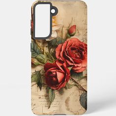 an old fashioned phone case with roses and leaves painted on it's back cover