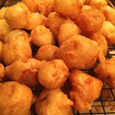 some fried food is cooling on a rack