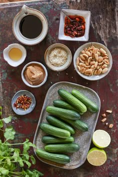 cucumbers, almonds and other ingredients on a table