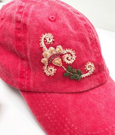 "100% cotton one size fits most embroidered hat with adjustable back buckle. Makes a great gift or a fun accessory!  DESCRIPTION: Vintage watermelon red stonewashed hand embroidered hat with colorful cotton embroidery inspired by Peruvian florals and motifs.  These are not made by machine, rather by hand, so small imperfections may occur. Cotton twill, low profile, floppy style. The hat circumference section is 22.04\"-23.22\". Adjustable metal buckle in back. Recommended hand wash cold and hang Pink Purple Party, Vintage Watermelon, Burned Hats, Boho Baby Girl, Colorful Hat, Denim Baseball Cap, Creative Sewing, Watermelon Red, Floral Hat