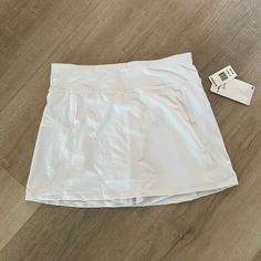 White Athletic Skort Never Worn And Tags Still On Kids Size Xl Casual White Moisture-wicking Skort, Summer White 4-way Stretch Skort, White 4-way Stretch Athletic Shorts, White 2-in-1 Athletic Shorts With 4-way Stretch, White Moisture-wicking Sports Skort, Teen Skirts, Toddler Overalls, Athletic Skort, Boys Joggers