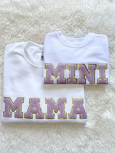 "Purple White Gold Glitter Chenille Letter Patch Mama Mini Matching Crewneck Sweatshirt Mother's Day Baby Shower New Mom Gift ✨ MIDWEST MODISH CO.  Thank you for considering a purchase from my shop! Please read the description to ensure your satisfaction prior to your purchase. For any questions, concerns, or custom order requests please message me & I will get back to you ASAP! ✨PRODUCT DETAILS -Gildan Unisex Brand - Adult Heavy Blend 8 oz Fleece Crewneck -50% cotton 50% polyester  -1x1 ribbed Mother's Day Gift Tops With Letter Embroidery, White Glitter Print Crew Neck Top, Gold Tops With Letter Print For Gifts, White Tops With Letter Embroidery For Mother's Day, Gold Crew Neck Top As Gift, Matching Crewneck, Cute Shirt Designs, New Mom Gift, Crew Neck Shirt