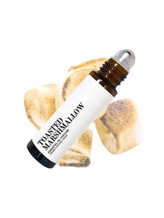 All natural and organic Toasted Marshmallow Perfume Oil is a great fragrance to wear for anyone looking for a cozy and sweet scent to wear. HOW IT SMELLS This perfume has a delicious sweet vanilla aroma with a hint of woody and spice notes. INGREDIENTS  Fractionated coconut oil, vanilla, cinnamon, nutmeg and cedarwood essential oils. PRODUCT PACKAGING This product is made in a 10mL glass bottle with a stainless steel roller ball and plastic cap. HOW TO USE Roll on wrist, temples, back of the nec Roll On Perfume Oil, Cinnamon Perfume, Marshmallow Roll, Marshmallow Perfume, Roller Perfume, Fragrance Lab, Organic Perfume, Sweet Perfume, Fragrances Perfume Woman