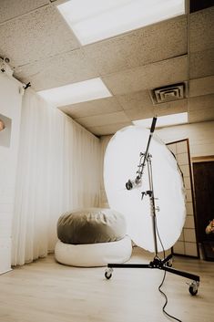 a large white object sitting on top of a hard wood floor