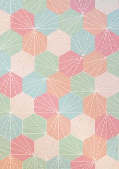 an abstract pattern made up of many different colors and shapes, including hexagonals