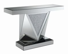 a silver table with a black base and some glitter on the top that is shaped like a triangle