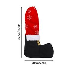 a christmas stocking with snowflakes on it and a bell hanging from the side