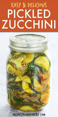 pickled zucchini in a mason jar with the title easy and delicious pickled zucchini