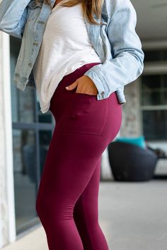 Introducing the Maroon Full Length Leggings with Pockets - designed with your lifestyle in mind!Crafted from a perfect blend of 92% poly and 8% spandex, these pants will have you feeling comfortable and confident all day long. Sporting two pockets, deep enough to hold anything from your cellphone to small accessories, this piece is not only super flattering but also extremely practical. Now available in OS (sizes 4-10), TC (sizes 12-18) and TC2 (sizes 20-28), you don't need to worry about findin Athleisure Yoga Pants, Nine Line Apparel, Julia Rose, Athleisure Accessories, Athleisure Leggings, Holiday Leggings, Athleisure Tops, Leggings With Pockets, Scarf Poncho