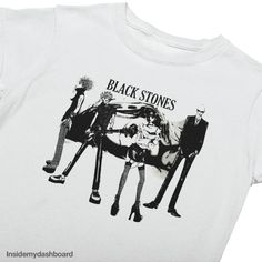 🎵 BLACK STONES BAND TEE: Capturing the essence of the Black Stones band, this tee is a stylish homage to the series. 🎁 Perfect Gift: Searching for a present for a NANA fan? This T-shirt is a thoughtful choice, ideal for birthdays, special occasions, or simply to express love for this beloved anime. 👕 Universal Sizing: Available in sizes from S to 3XL, it provides a comfortable fit for fans of all sizes. We offer a regular unisex fit (200g/m a women's fitted tee (180g/m and a heavy boxy tee (2 Black Punk T-shirt With Character Print, Black Alternative T-shirt With Anime Print, Black Alternative Style T-shirt With Anime Print, Edgy Crew Neck T-shirt With Character Print, Black Alternative Anime Print T-shirt, Edgy Character Print Crew Neck T-shirt, White Grunge T-shirt With Anime Print, White Grunge Anime Print T-shirt, Black Punk T-shirt With Anime Print